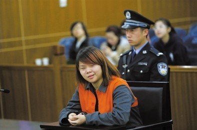 2013年4月3日，被告人小萍在法庭上受審。新京報記者 王貴彬 攝