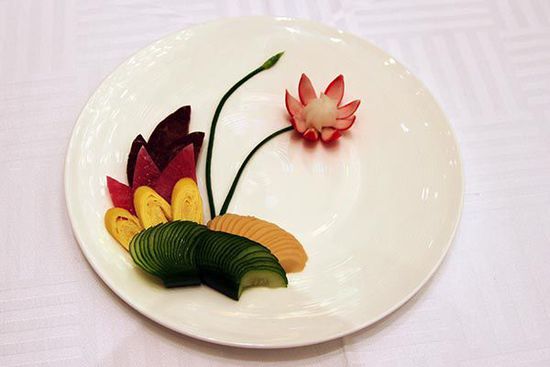 迎賓冷盤(pán)“洋花蘿卜”。 花惠生 供圖